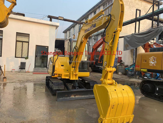 Excavadora usada Komatsu PC56 com capacidade de 0.25 baldes e peso da máquina de 5600 kg