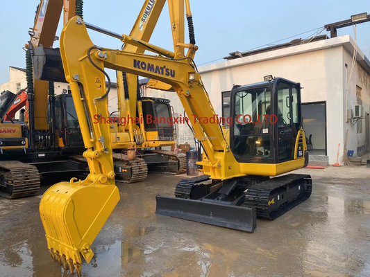 Excavadora usada Komatsu PC56 com capacidade de 0.25 baldes e peso da máquina de 5600 kg